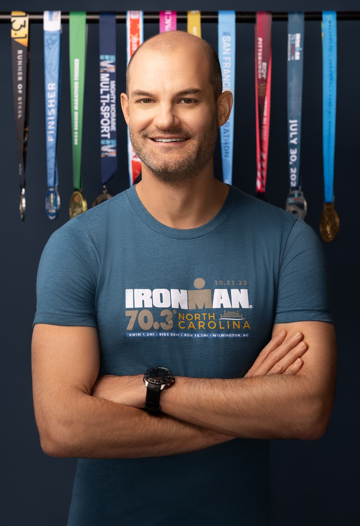 Matt Harris with athletic achievements and medals
